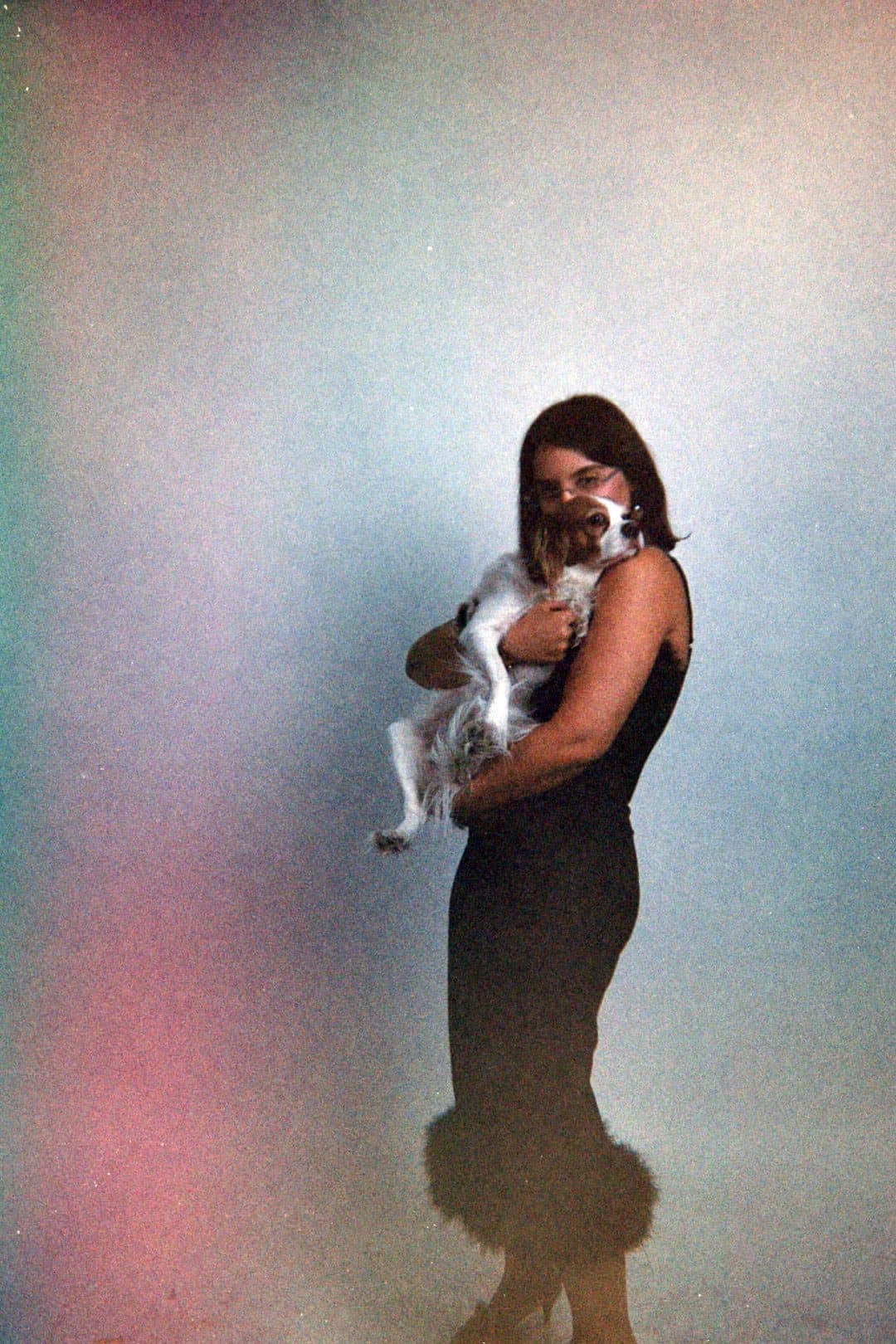 Shimrit from Mishimono holding a small dog